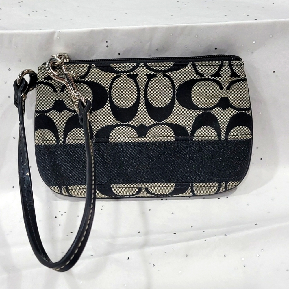Black and gray logo Coach Wristlet